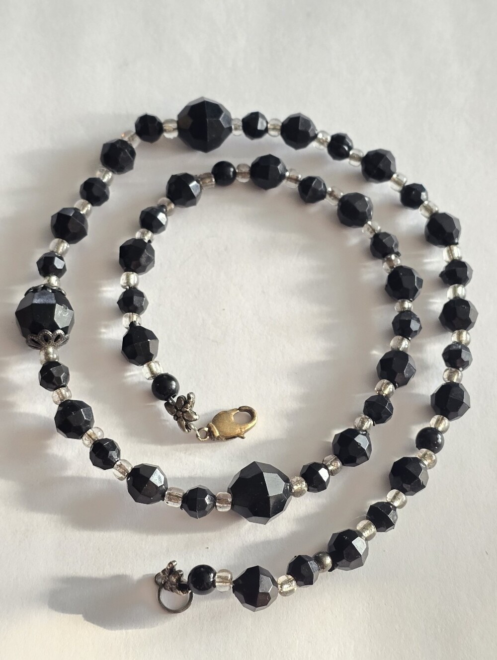 Beaded necklace black clear plastic